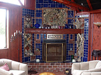 “Unique” Tile, Stone & Brick Fireplace
